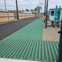 Tapis de renforcement PMR sur gazon GRASSMAT – Fun2Access